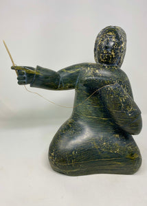 ‘WOMAN SEWING KAMIKS”. ISAAC ETIDLOIE
