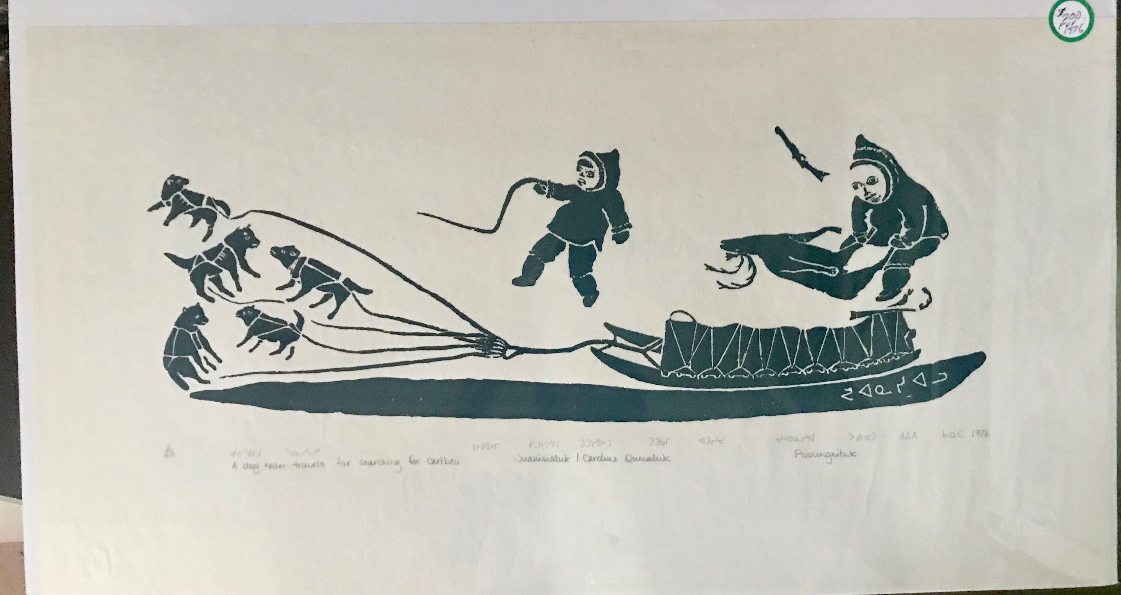A DOG TEAM TRAVELS FAR SEARCHING FOR CARIBOU- JUANISIALU IRQUMIA